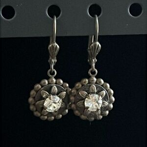 Liz Palacios silver and crystal dangle flower/star in circle